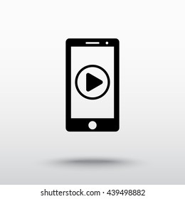Mobile phone with play button sign icon, vector illustration. Flat design style