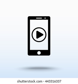 Mobile phone with play button sign icon, vector illustration. Flat design style