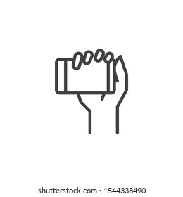 Mobile phone using hand line icon. linear style sign for mobile concept and web design. Hand with smartphone outline vector icon. Symbol, logo illustration. Vector graphics