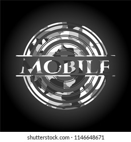 Mobile written on a grey camouflage texture