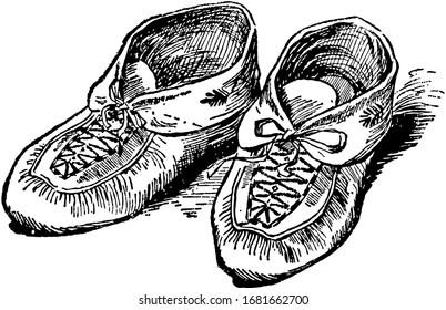 Moccasins is a Indian's shoes, vintage line drawing or engraving illustration.