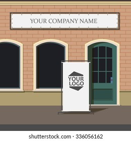 Mock up. Blank advertising pillar on the street near a shop or a cafe. Shop sign.