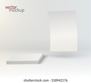 Mockup a4 leaflet and pile of blank sheets on white background.  Vector eps10.