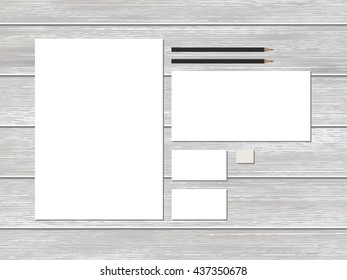 Mock-up business stationery template on wood.