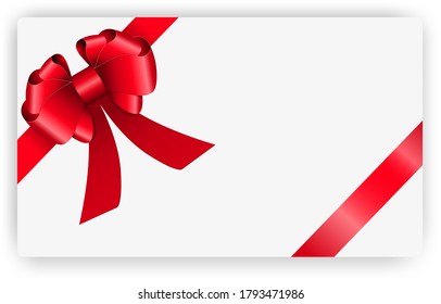 Mockup greeting card on a white background with a red bow and red ribbon.Red bow and red ribbon isolated on white background.For use in decorative design.