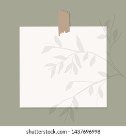 Mockup poster or paper for notes attached to a wall with a falling leaf shadow. 