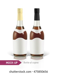 Mockup realistic bottles of cognac on a white background with reflection and shadow. Template for label design.