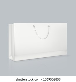Mockup of realistic rectangular white paper bag. Corporate identity blank packaging, shopping bag. Branding packaging template with handles. Gift, festive boxing for products. Vector illustration.