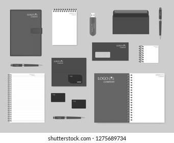 Mock-up set for corporate brand identity design. Notebooks, envelopes, business cards, card holder, pen, USB flash drive. Vector template.