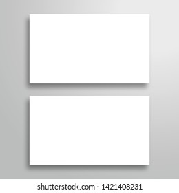 Mock-up of two blank horizontal business cards with shadow. Isolated object for your design