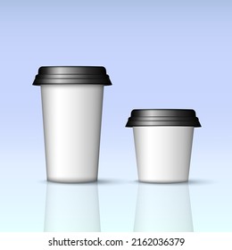 Mockup of two white paper coffee cups with black lids. Big and small plastic cups for hot drinks. 3D realistic coffee cups template