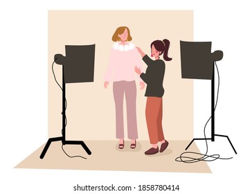 Model is being dressed by stylist during photo session break in studio with flat cartoon style vector design