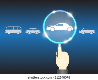Model of car and magnifier on dark background.