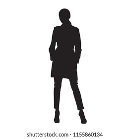 Model woman posing and standing with legs apart, front view. Isolated vector silhouette. Fashion show. Autumn clothing