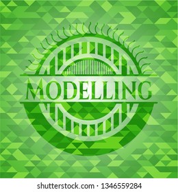 Modelling green emblem with triangle mosaic background