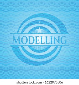 Modelling sky blue water wave badge background. Vector Illustration. Detailed.