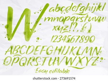Modern alphabet set drawn watercolor blots and stains with a spray blue color.