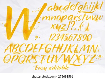 Modern alphabet set drawn watercolor blots and stains with a spray orange color.