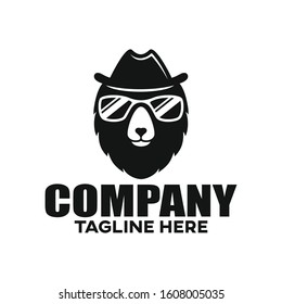 Modern bear in a hat and glasses logo. Vector illustration.