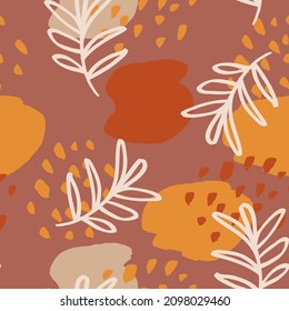 Modern boho seamless pattern with abstract shapes and leaves. Contemporary fashion background in earth color tones