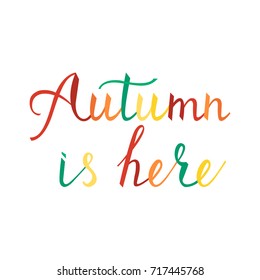 Modern brush phrase autumn is here. Word of Fall isolated on white background. trendy colors of autumn
