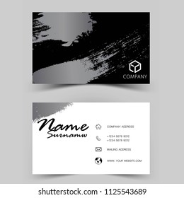 Modern business card design. Inspired by the brush. Black and white color on gray background.