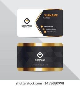 Modern business card design template. Gray and golden color with triangle element decoration name card design.