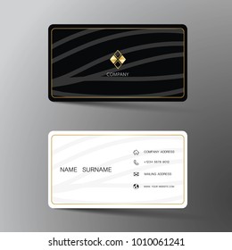 Modern business card template design. With inspiration from the abstract. Contact for company. Two sided black and white on the gray background. Vector illustration. 
