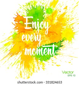 Modern calligraphy hand drawn inspirational quote - "Enjoy every moment" on multicolored watercolor splash blot. Modern calligraphy brush lettering. Vector card, poster design with unique typography.