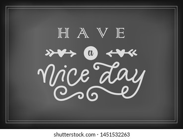 Modern calligraphy lettering of Have a nice day in white with arrows and hearts on chalkboard background for decoration, poster, banner, greeting card, restaurant, cafe, bar, flower shop, market