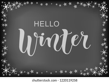 Modern calligraphy lettering of Hello Winter in white on blackboard background with frame of stars and snowflakes for calendar, poster, banner, restaurant, cafe, bar, sticker, decoration