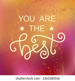 Modern calligraphy lettering of You are the best in white on orange pink background with texture for decoration, design, sticker, logo, stamp, postcard, greeting card, gift tag, poster