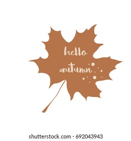 Modern calligraphy phrase Hello Autumn. Vector autumn quote with brown leaf