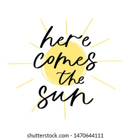 Modern calligraphy unique handdrawn quote - here comes the sun. Positive motivation text on yellow sun background. Typography inspiration poster, trendy sunny t-shirt print, card design