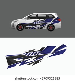 A modern car livery design featuring bold geometric shapes in blue, black, and white.
