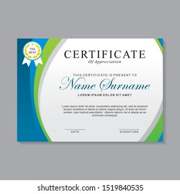 Modern certificate template design with blue, green and white color. Diploma certificate design 