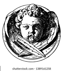 Modern Cherub Head is a design on a medallion, It is a winged angel face, vintage line drawing or engraving illustration.