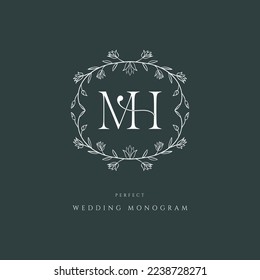 Modern classic MH wedding monogram serif font. Unique, luxurious, mature and elegant floral style logo. Perfect for a wedding monogram.