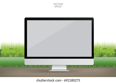 Modern computer display on wood table with green natural background, Vector illustration.