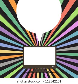 Modern computer with the speech cloud and color rays