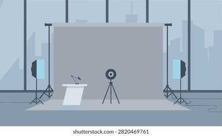 Modern corporate studio recording set features a grey backdrop, a podium, a camera on tripod, and professional lighting.