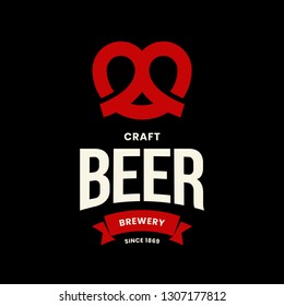 Modern craft beer drink vector logo sign for bar, pub, store, brewhouse or brewery isolated on black background. Premium quality pretzel logotype illustration. Brewing fest emblem t-shirt badge design