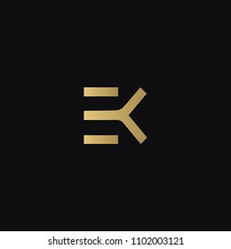 Modern creative geometric shaped EK KE E K artistic minimal black and golden color initial based letter icon logo.