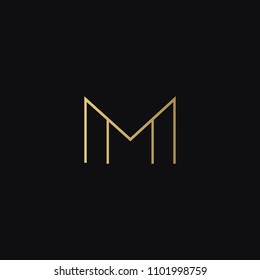 Modern creative geometric shaped MM M artistic minimal black and golden color initial based letter icon logo