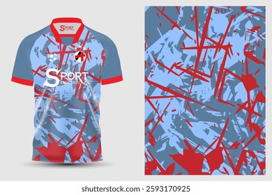 A modern design football shirt with a light blue base color and a flashy graphic pattern consisting of red and other dark colors, giving the shirt a lively look.