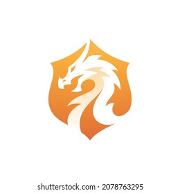 Modern Dragon Shield Badge Crest Vector. Negative Space Dragon Head And Shield Logo Icon