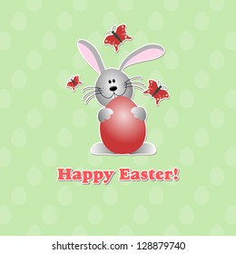 Modern easter-bunny holding an egg decorated with butterflies