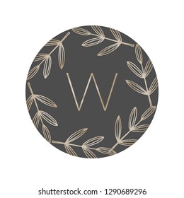 Modern and elegant monogram wreath logo design for florists, cosmetics, weddings and home decor. Nature inspired vector illustration in gold on dark gray circle isolated on white background.
