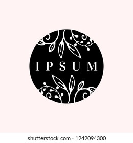 Modern and elegant premade typographic logo design for florists, cosmetics, weddings and home decor. Hand drawn nature inspired vector illustration in black and white isolated on pink background.