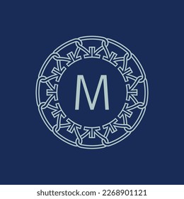 Modern emblem initial letter M ornamental tribe pattern circular logo
